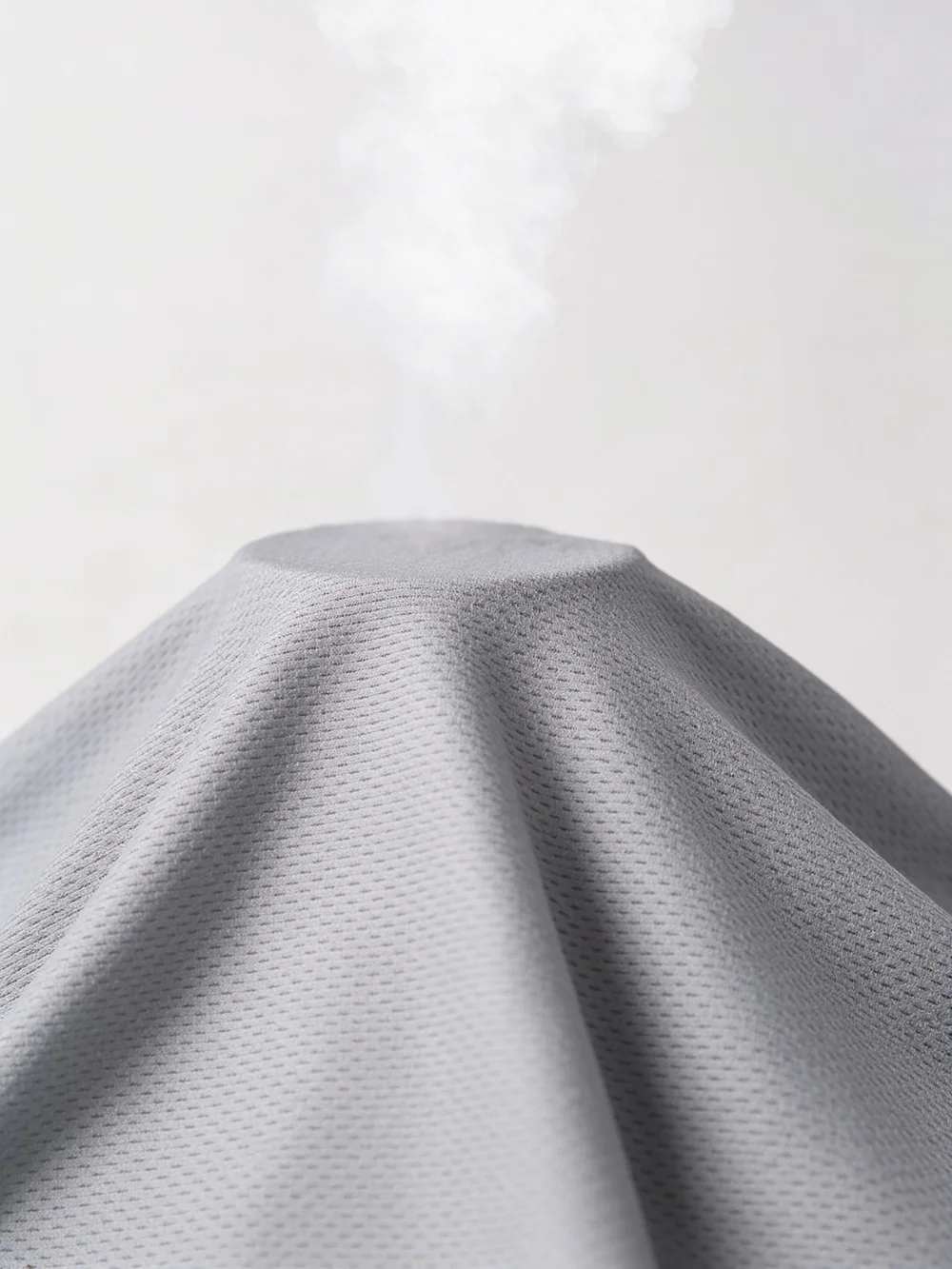 AI fabric photo example: gray textured knit fabric close-up