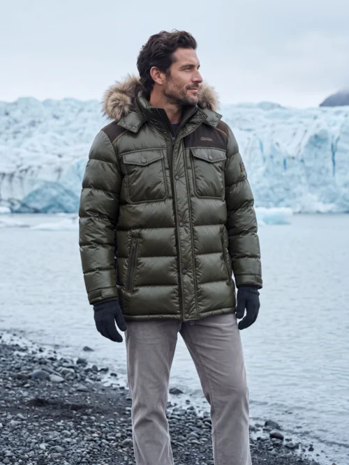 The same jacket in a virtual try-on shot — an AI model on a glacial shoreline